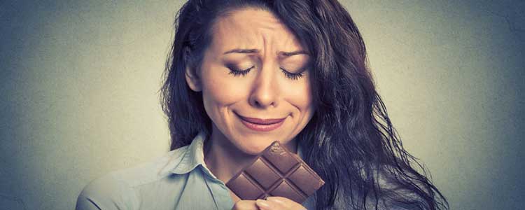 Woman Looking at Chocolate