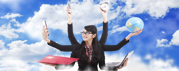 young dark haired business woman holding multiple objects